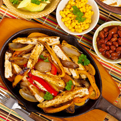 Chicken Fajitas with Grilled Onions and Bell Peppers. Selective focus.