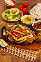 Chicken Fajitas with Grilled Onions and Bell Peppers. Selective focus.