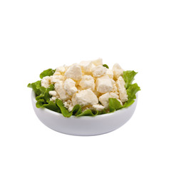 Feta Crumbled Cheese Isolated on White. Selective focus. © Ali Safarov