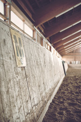 Wooden paneling at an indoor riding school