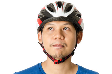 The man wearing bike helmet and thinking,isolated on white background