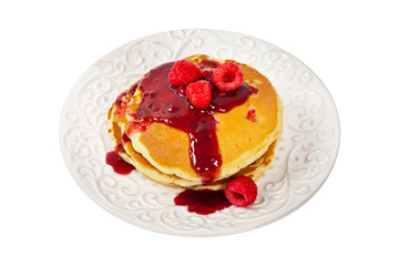 Pancakes with Raspberry Isolated on White. Selective focus.
