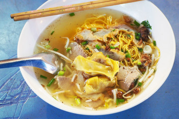 yellow noodles with vegetables and meat