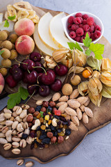 Naklejka na ściany i meble Fruit and nuts snack board