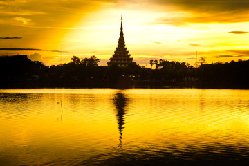 Thailand Bhudda temple golden Stupa Khonkaen landmark,Temple Silhouette in Khon Kaen, Thailand  Wat Nong Waeng (Temple), © kowit1982