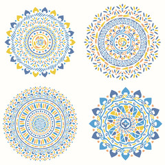 Collection of bright colorful geometric round ethnic decorative elements. Vector mandala backgrounds with bohemian, African, Oriental, Indian, Arabic motifs.