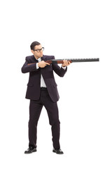 Businessman shooting with a rifle