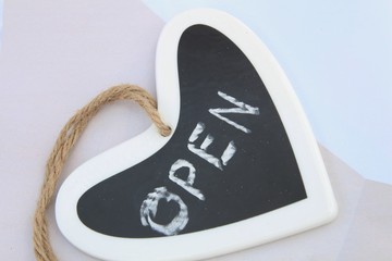 Open. Freehand drawing. Hand writing information on blackboard, can be used as a small business starting concept