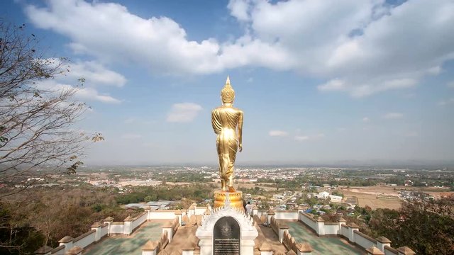 Time lapse fo Buddha standing on a mountain Wat Phra That Khao Noi, Nan Province, Thailand