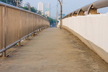 Concrete sidewalk on the bridge. The infrastructure in Bangkok, Thailand.
