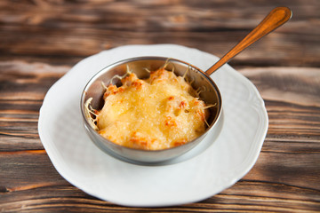 Casserole with chicken and mushrooms  julienne on the table. top