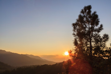 Fototapeta na wymiar Beautiful sunset over big mountain background