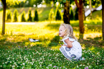 Little girl walking in the park