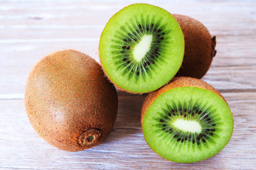 Close up of slice kiwifruit on a wooden background