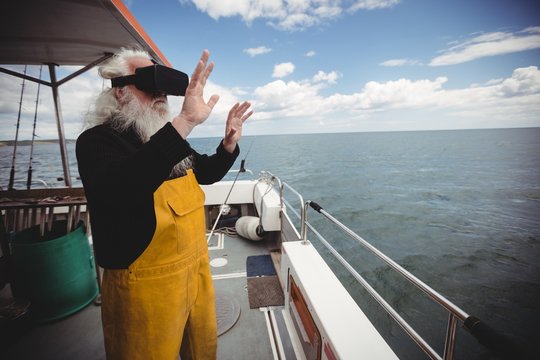 Fisherman using virtual reality glasses