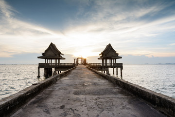 Pavillion with concrete bridge into the sea at Djittabhawan temp