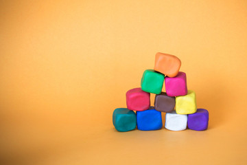 stack of colorful cubes , group of unity concept 