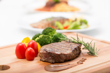 Grilled beef steak serve with colorful vegetable prepare to serve