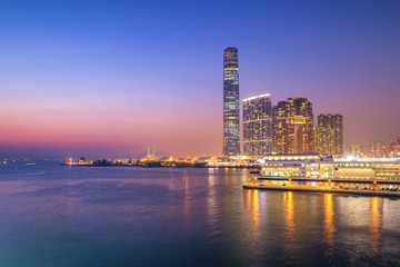 Beautiful Building in Hong Kong at night and Victoria Harbor vie