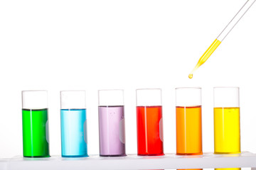 Chemistry test in flask glassware in laboratory with white background