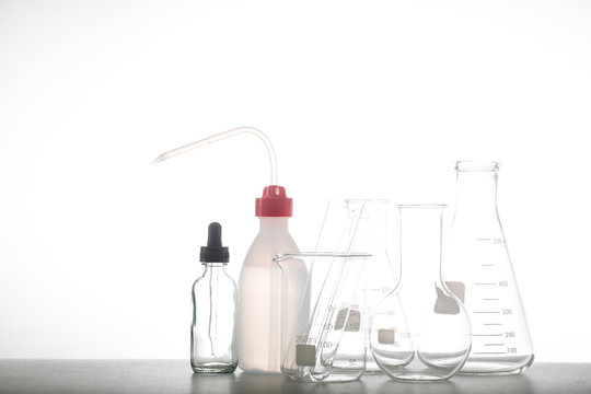Chemistry flask glassware in laboratory with white background