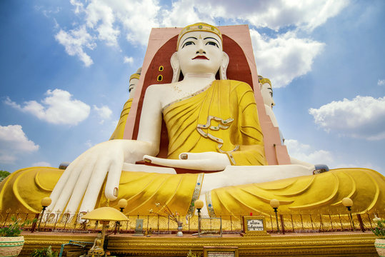 Buddha Statue, Kyaikpun Pagoda in Bago, Myanmar