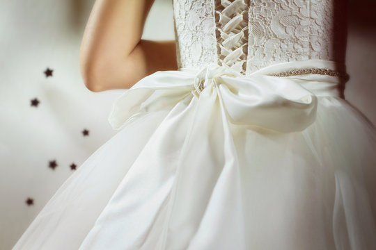 A closeup image of wedding preparations. Bride in dress