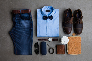 Men's fashion, casual outfits with accessories, flat lay, top view on gray grunge background