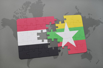 puzzle with the national flag of yemen and myanmar on a world map background.