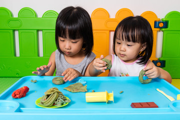 Asian Little Chinese Girls Playing with Colorful Clay