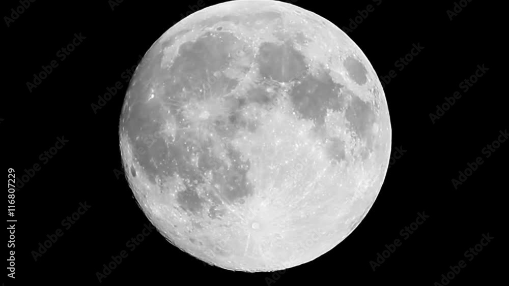 Wall mural clear full moon close up crossing the frame timelapse