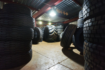 Fototapeta na wymiar Car tires on warehouse
