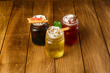 refreshing lemonade with fruit and ice. White background
