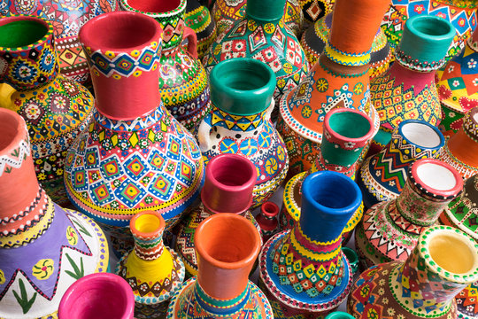 Composition of artistic painted handcrafted pottery vases