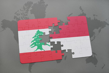 puzzle with the national flag of lebanon and indonesia on a world map background.