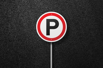 Road sign circular shape on a background of asphalt. Parking. The texture of the tarmac, top view.