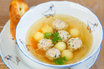 Soup on wooden background