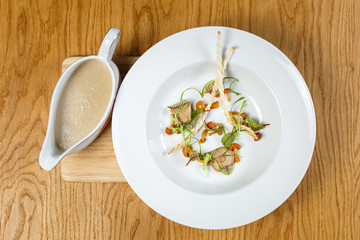 Soup on wooden background