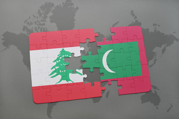 puzzle with the national flag of lebanon and maldives on a world map background.