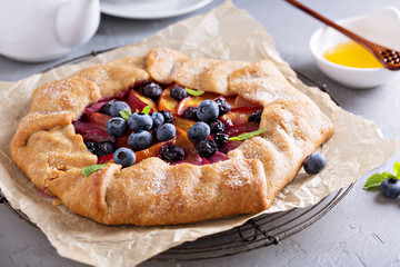 Rustic gallette pie with peaches and blueberry