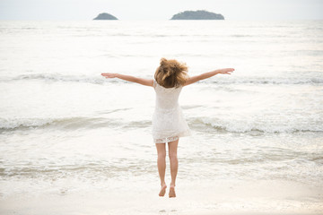 Beautiful Girl on The Beach. Travel and Vacation. Freedom Concept