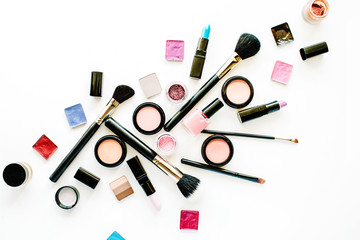 Fototapeta na wymiar flat lay female cosmetics collage with lipstick, brush on white background. top view set