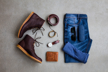 Men's casual outfits with man clothing and accessories on gray grunge background