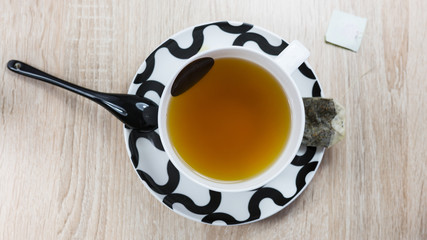 Breakfast tea with chinese spoon