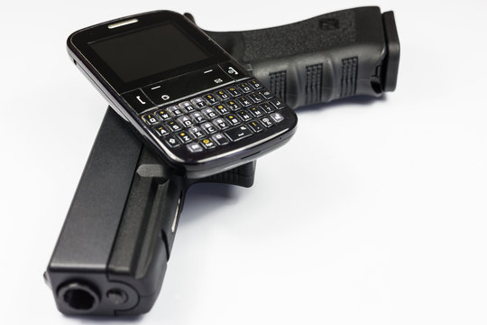 A gun and a old cell phone