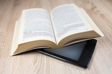 Obraz premium Old book and modern one