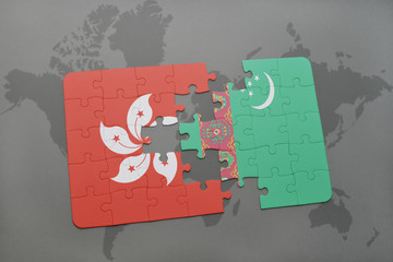 puzzle with the national flag of hong kong and turkmenistan on a world map background.