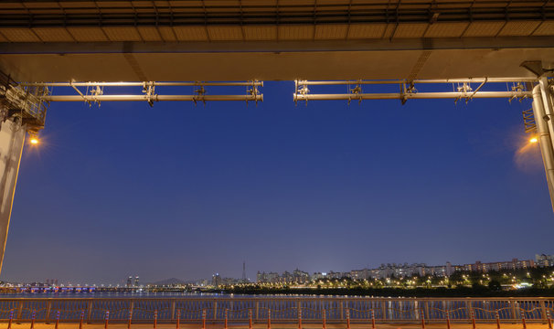 Seoul city at night  by looking from the lower deck of Banpo bridge