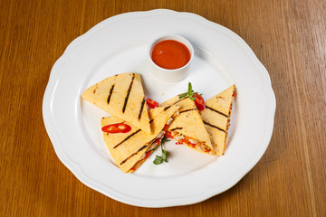 Beautiful meat dish on a wooden background