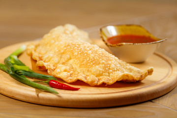 Beautiful meat dish on a wooden background